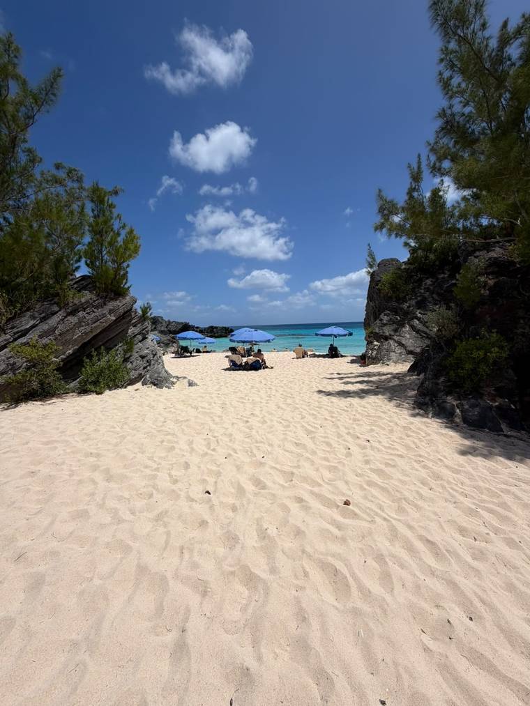 Pink sand and rock formations at the entrance to Chaplin Bay